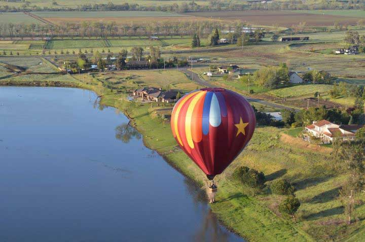 Hot Air Balloon Star over a lake - Rancho Murieta, CA